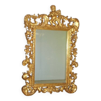 Imposant Miroir, bois sculpté doré, à décor de Putto