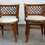 Rattan set with table and two armchairs.
