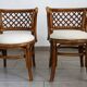 Rattan set with table and two armchairs.