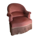 Fauteuil crapaud vintage rose en velours a franges