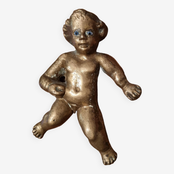 Rare bronze child statuette with blue eyes