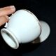 Paris porcelain – Antique round cup in soft porcelain with gold trim.