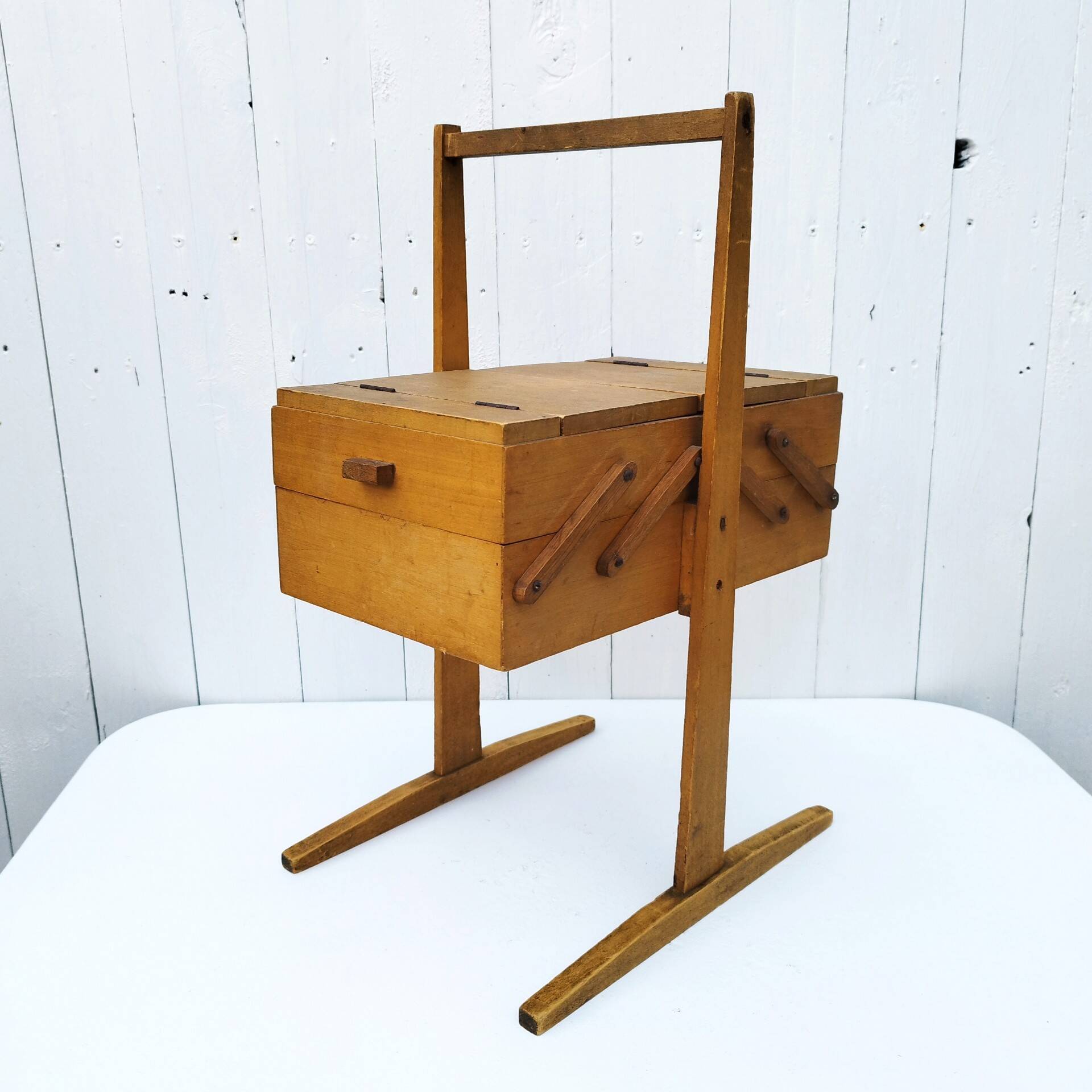 Old wooden folding sewing box