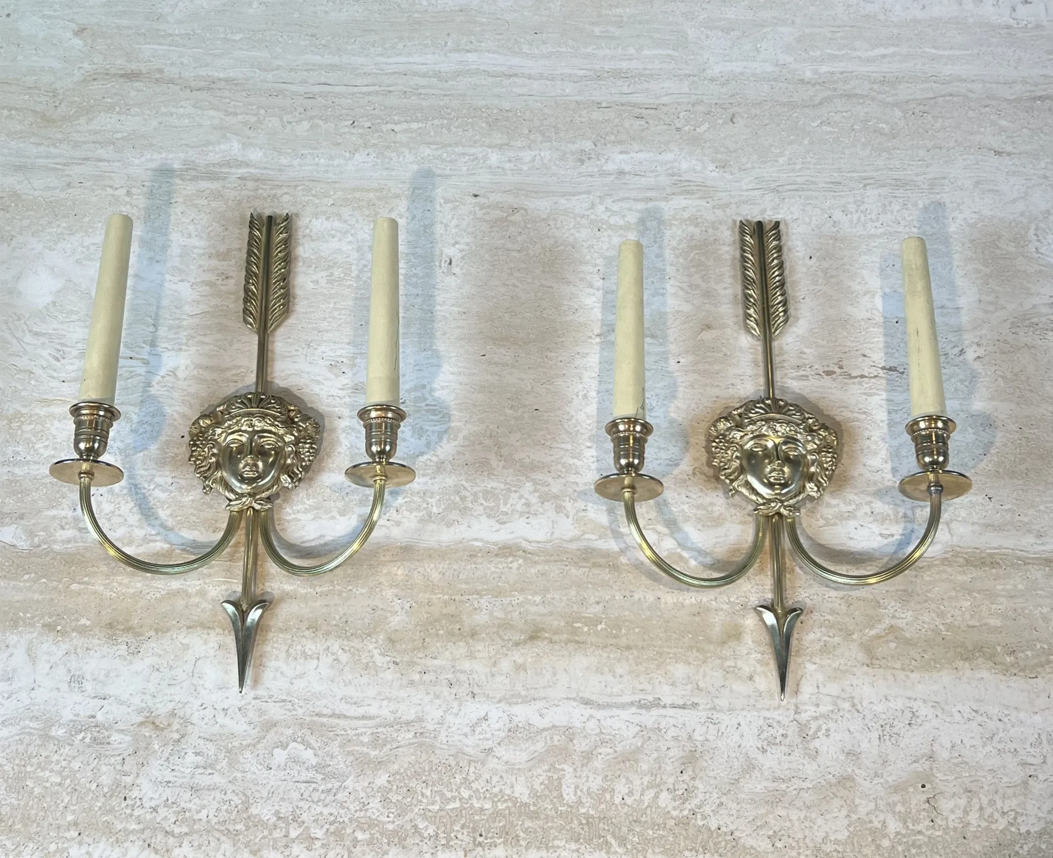 Pair of Two-Arm Bronze Wall Lights with Arrow and Mask Decoration