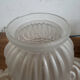 Antique bronze wall light in Louis XVI style - tulip-shaped glass paste flower.
