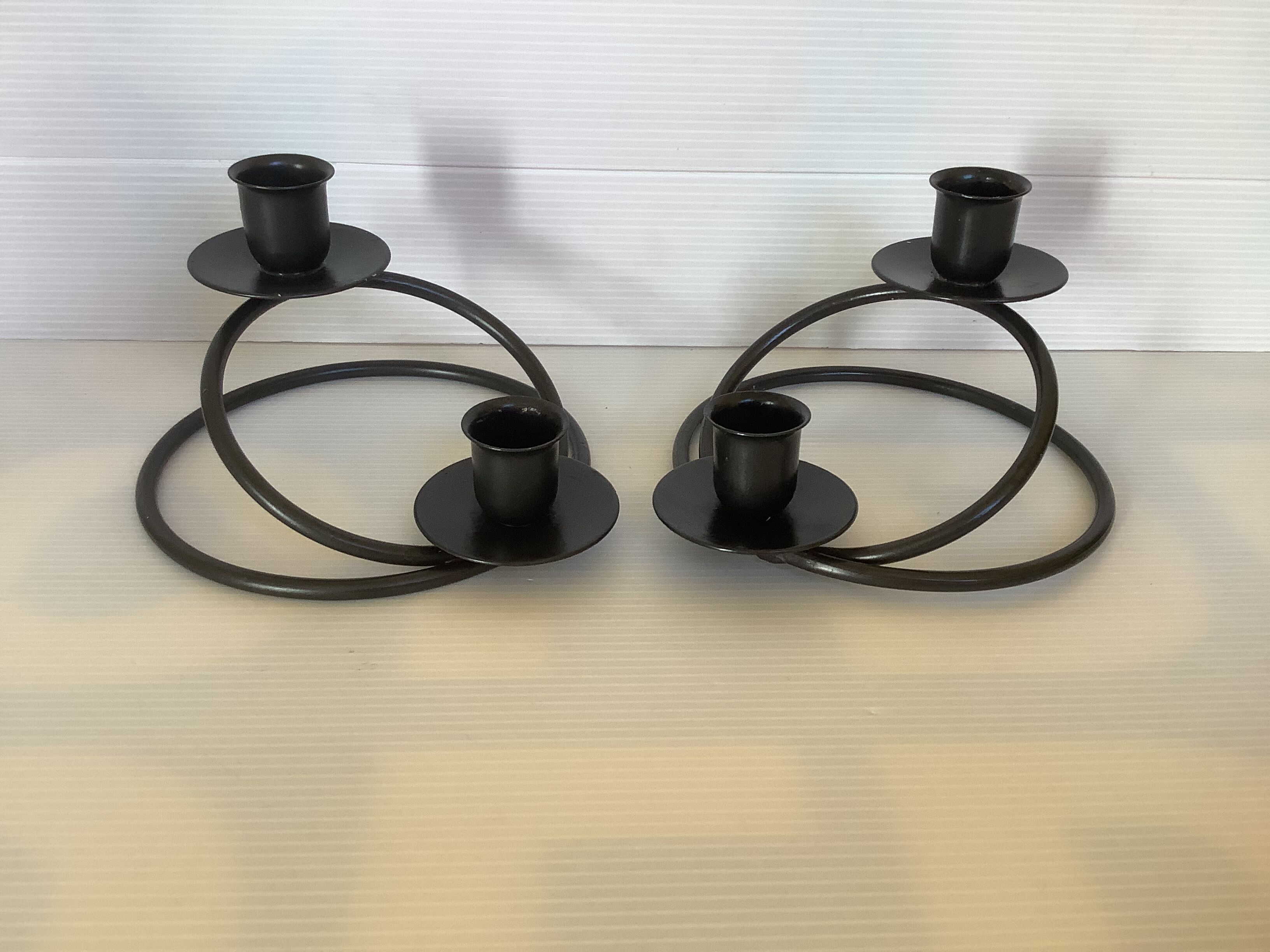 Pair of brutalist black metal candlesticks