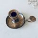 Brass thumbscrew candle holder