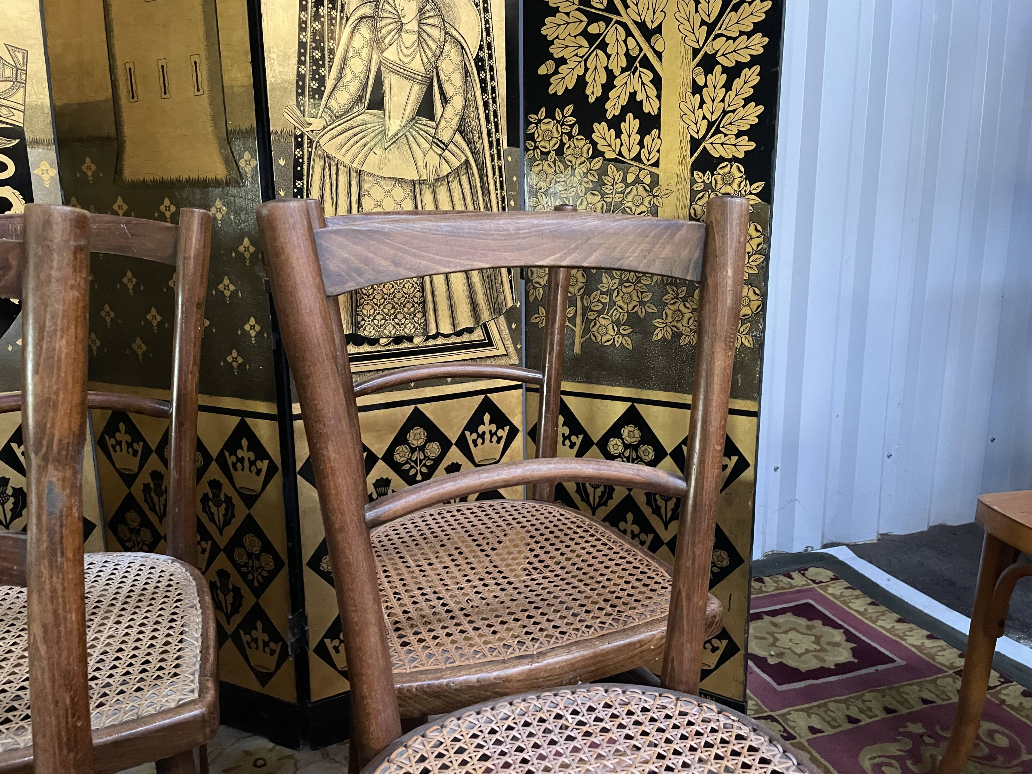 Suite of 10 bistro chairs in cannage