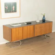 Striking mid-century sideboard with stainless steel base