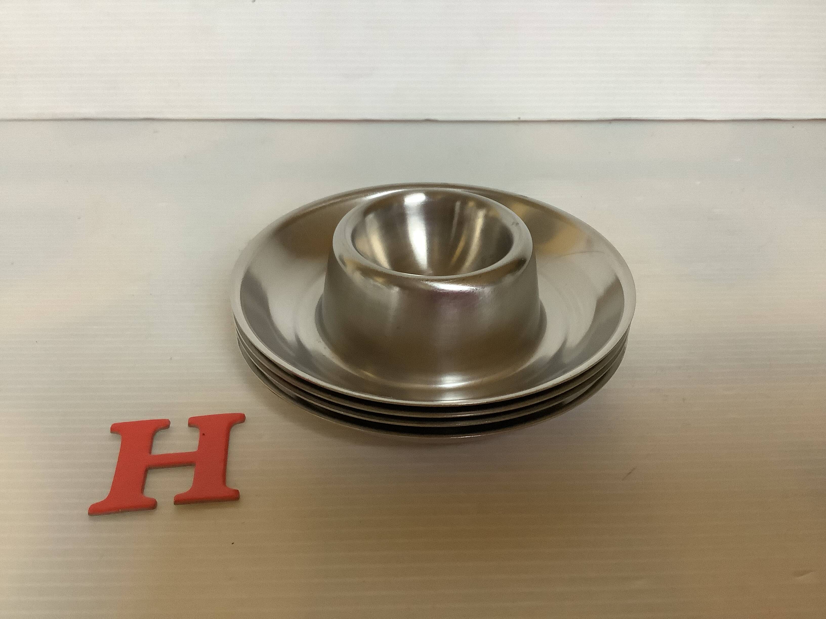 Four Belgium H stainless steel egg cups