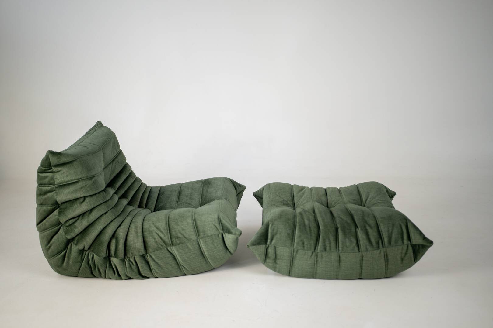 Togo set of armchair and pouf in moss velvet