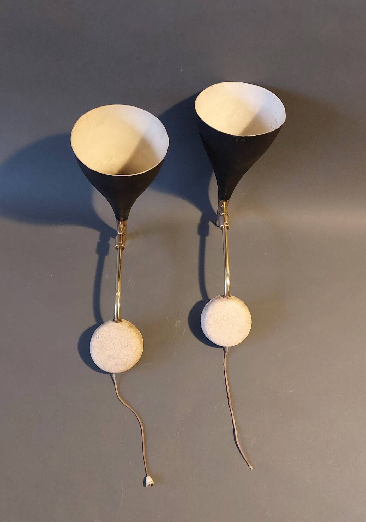 Pair of bedroom sconces in gilded brass and black aluminum 1960.