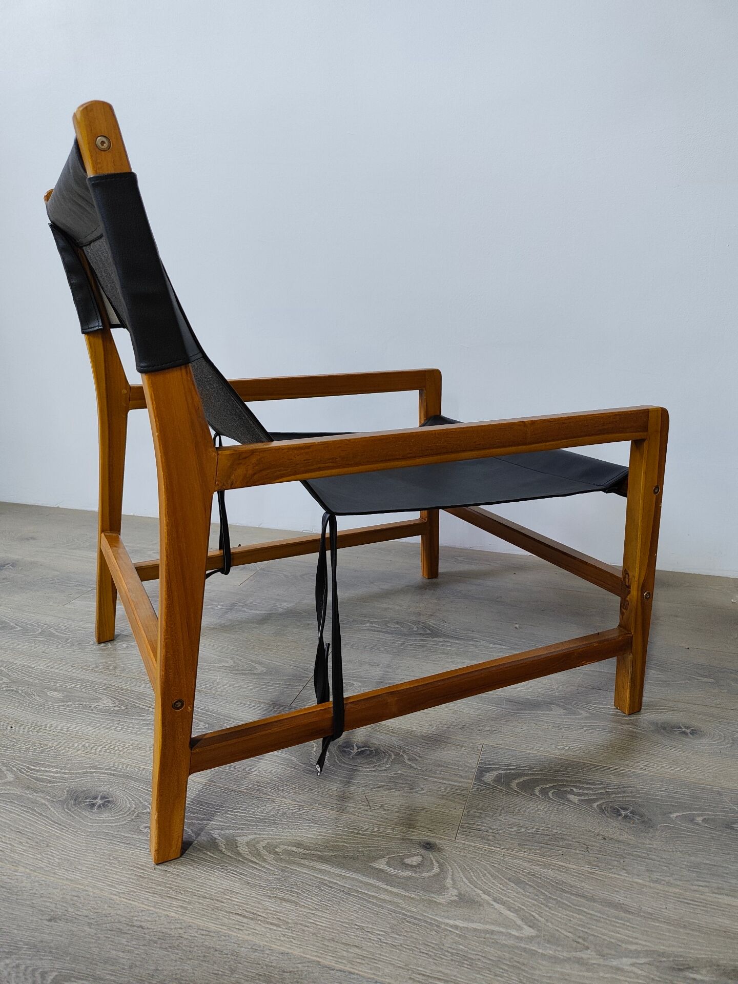 Leather and teak armchair