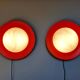 Pair of XXL Space Age wall sconces, orange lacquered metal and opaline, 1960.
