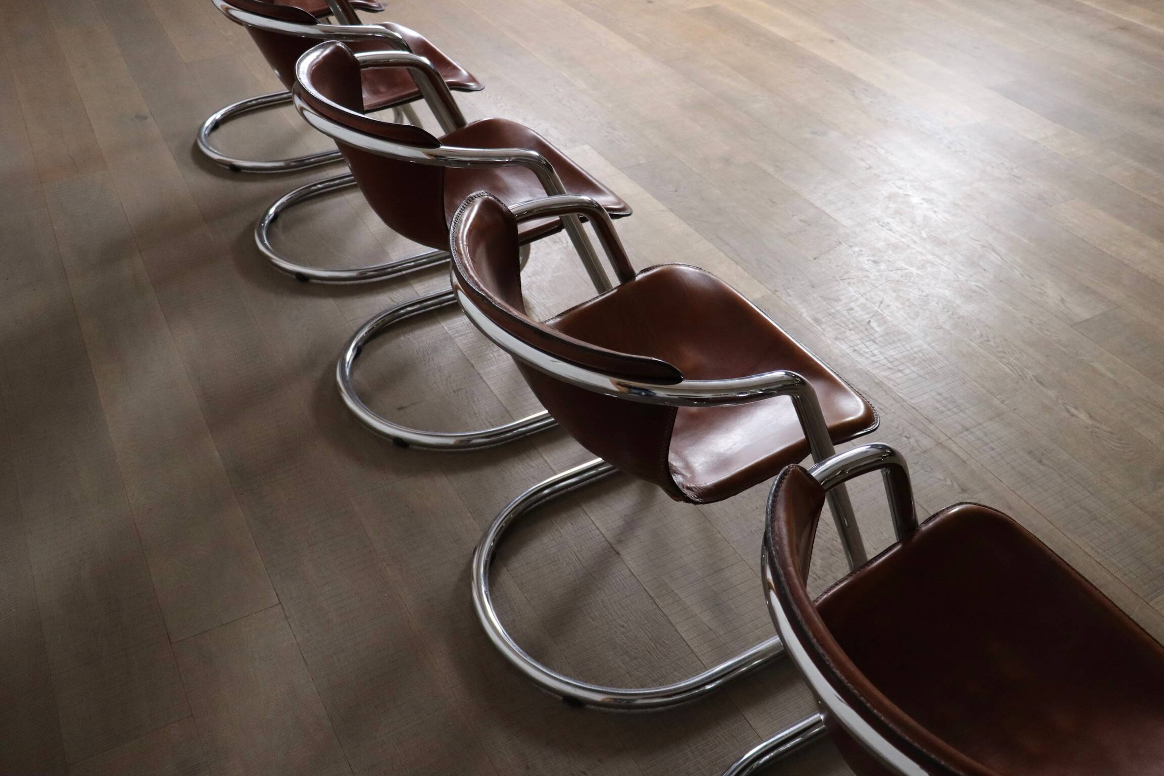 Set of 6 tubular chrome and saddle leather dining chairs for Metaform, 1970
