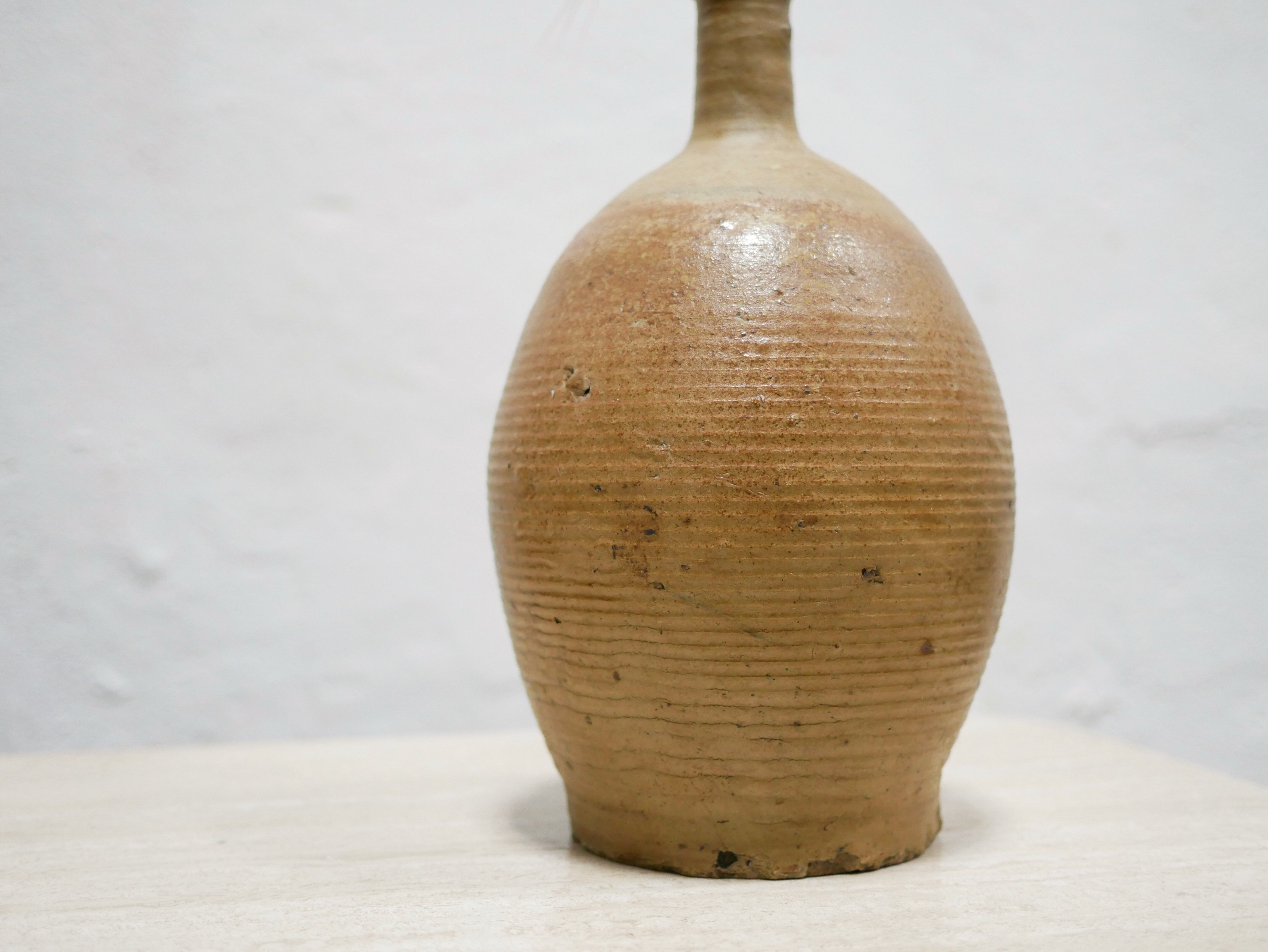 Vintage glazed terracotta jar