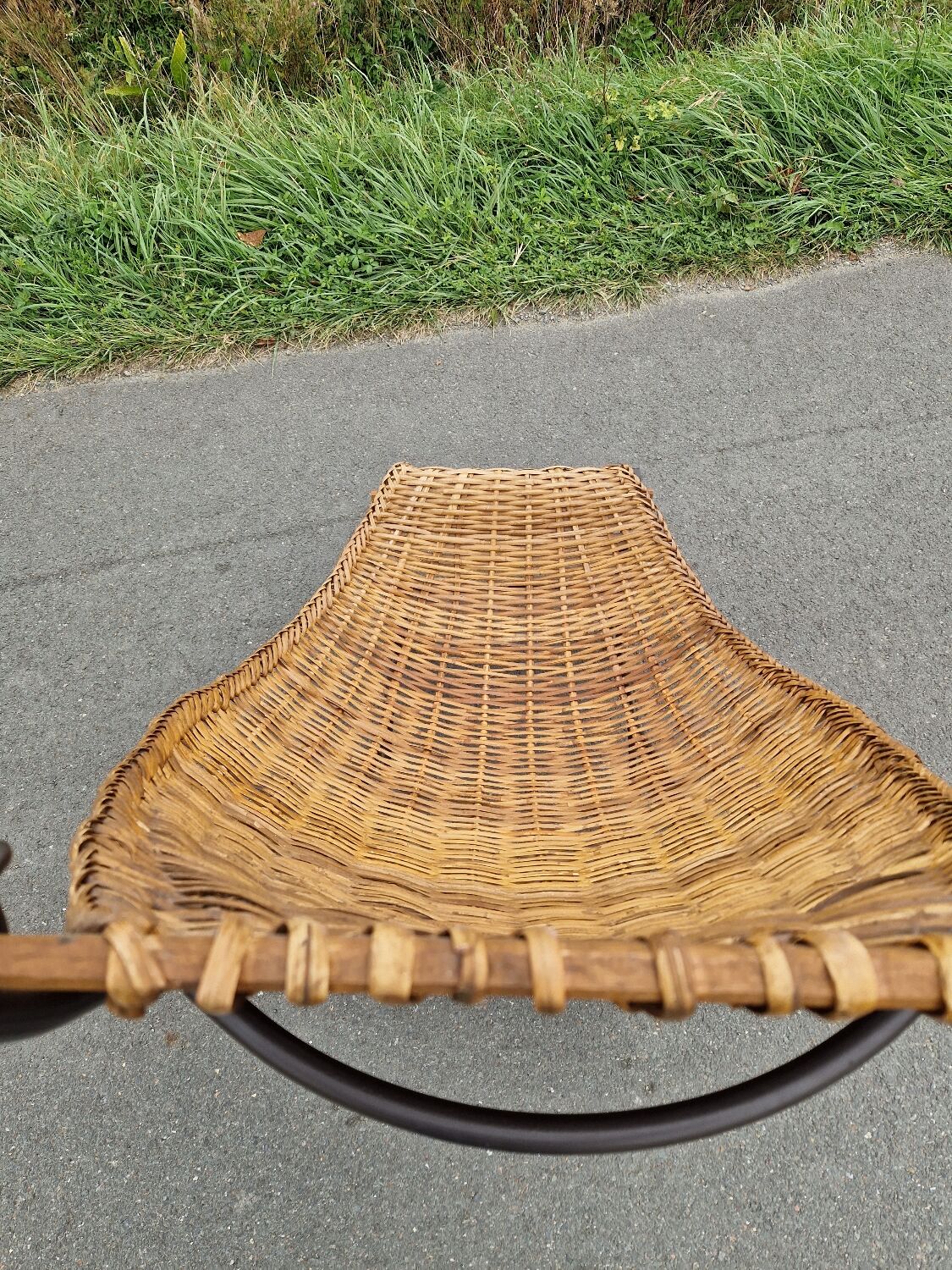 Large vintage metal and wicker armchair