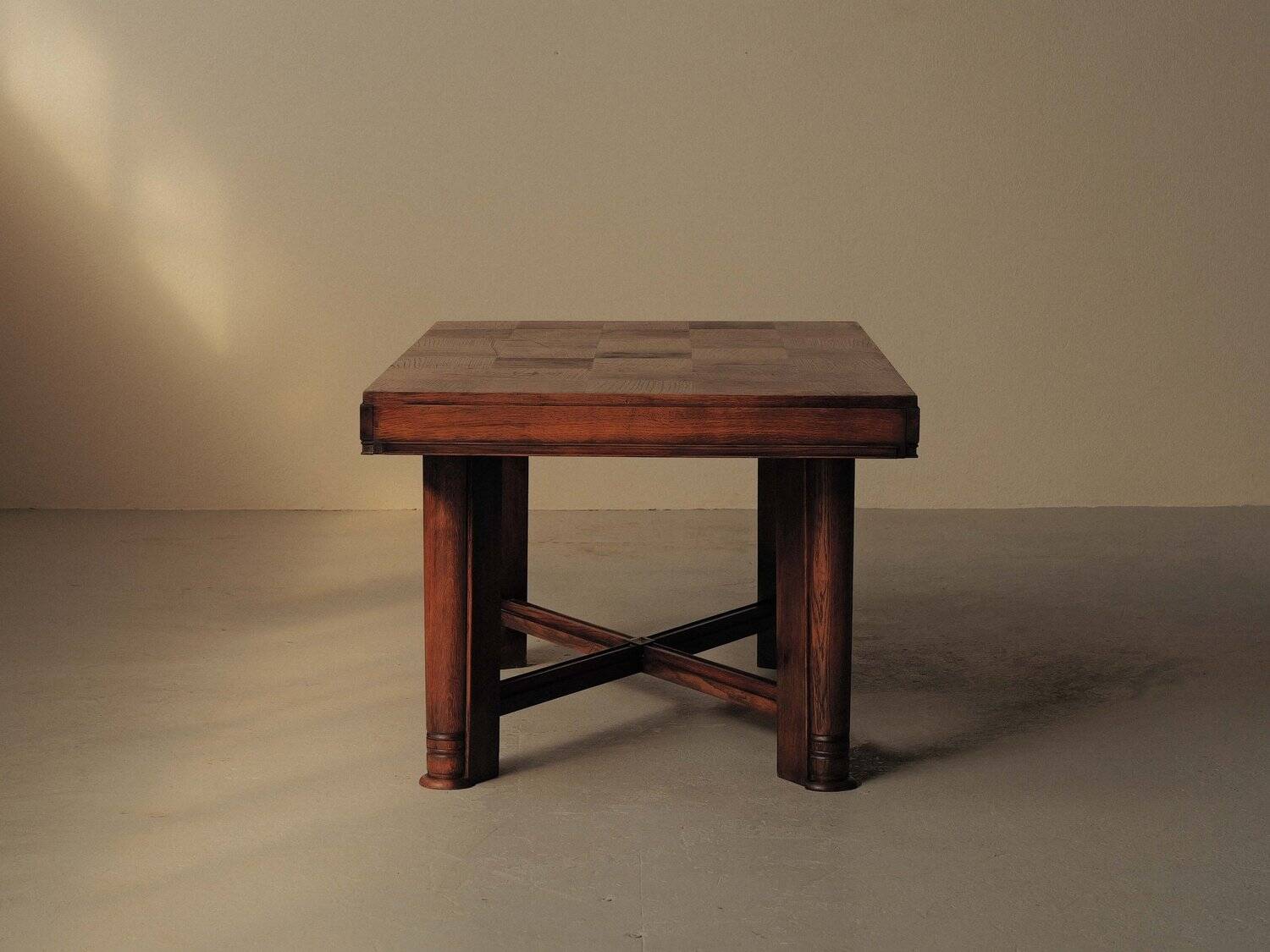Modernist oak table with a checkerboard top, France, circa 1940.
