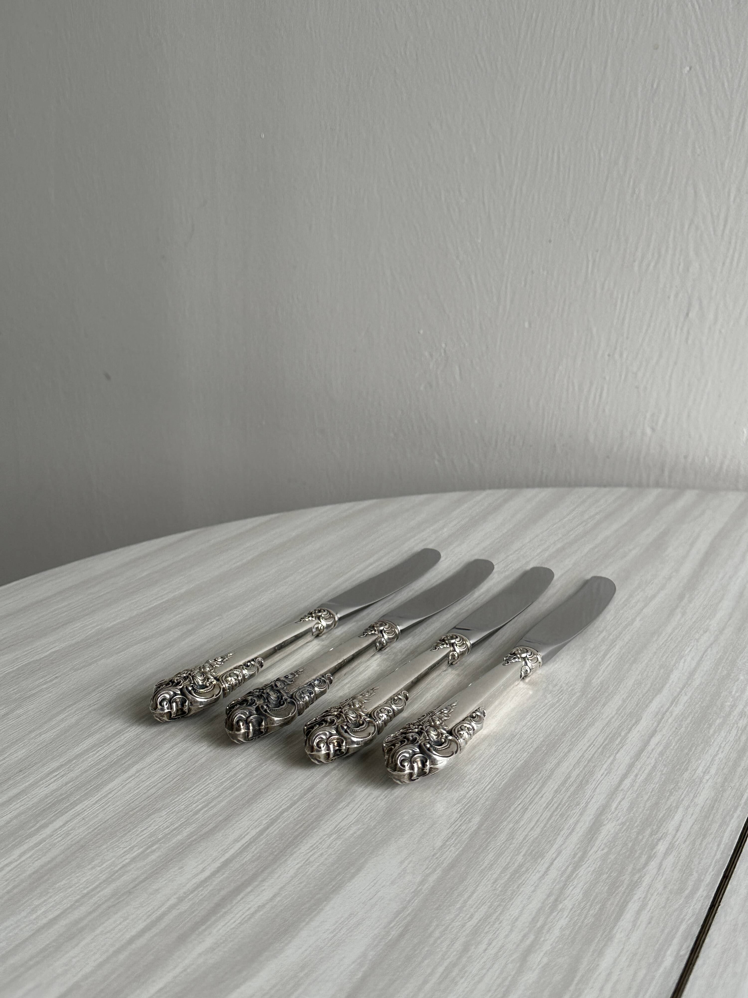 1 antique silver-plated metal knife