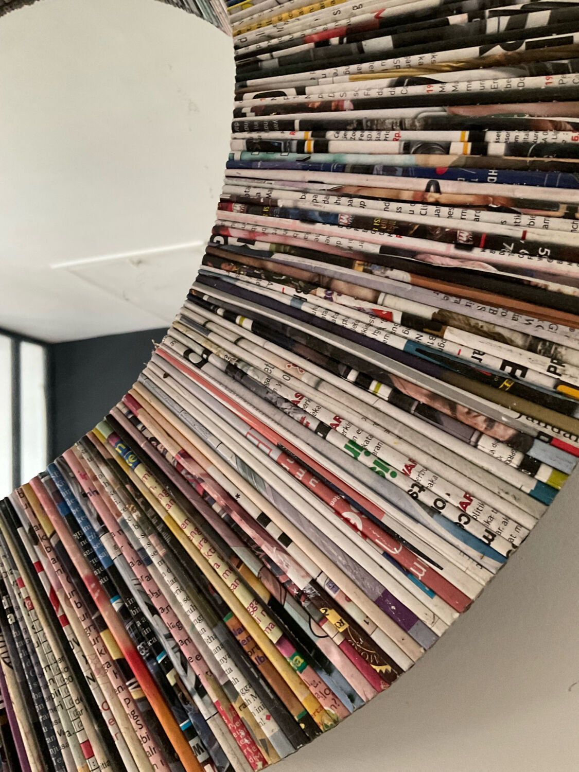 Vintage round mirror made of paper rolls