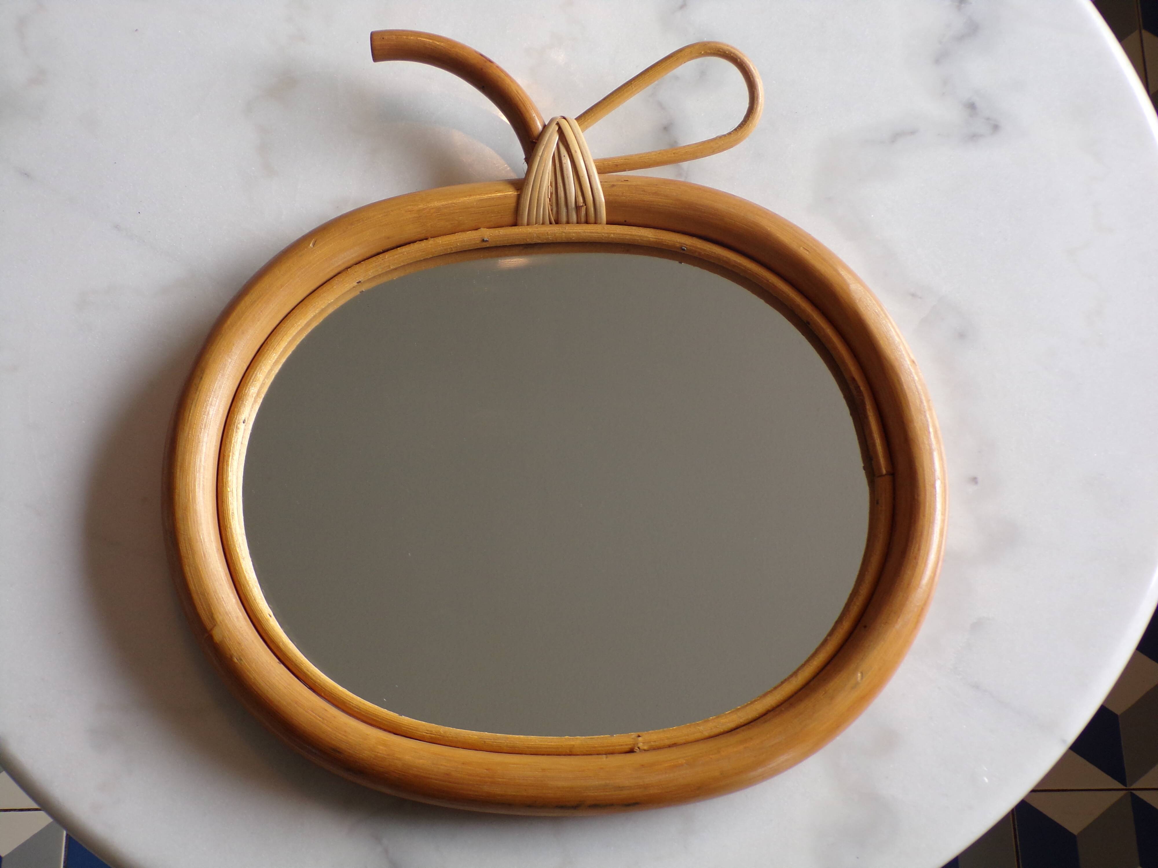Vintage rattan apple mirror