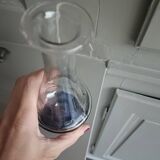 White and blue blown glass carafe