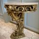 Carved wooden and marble console