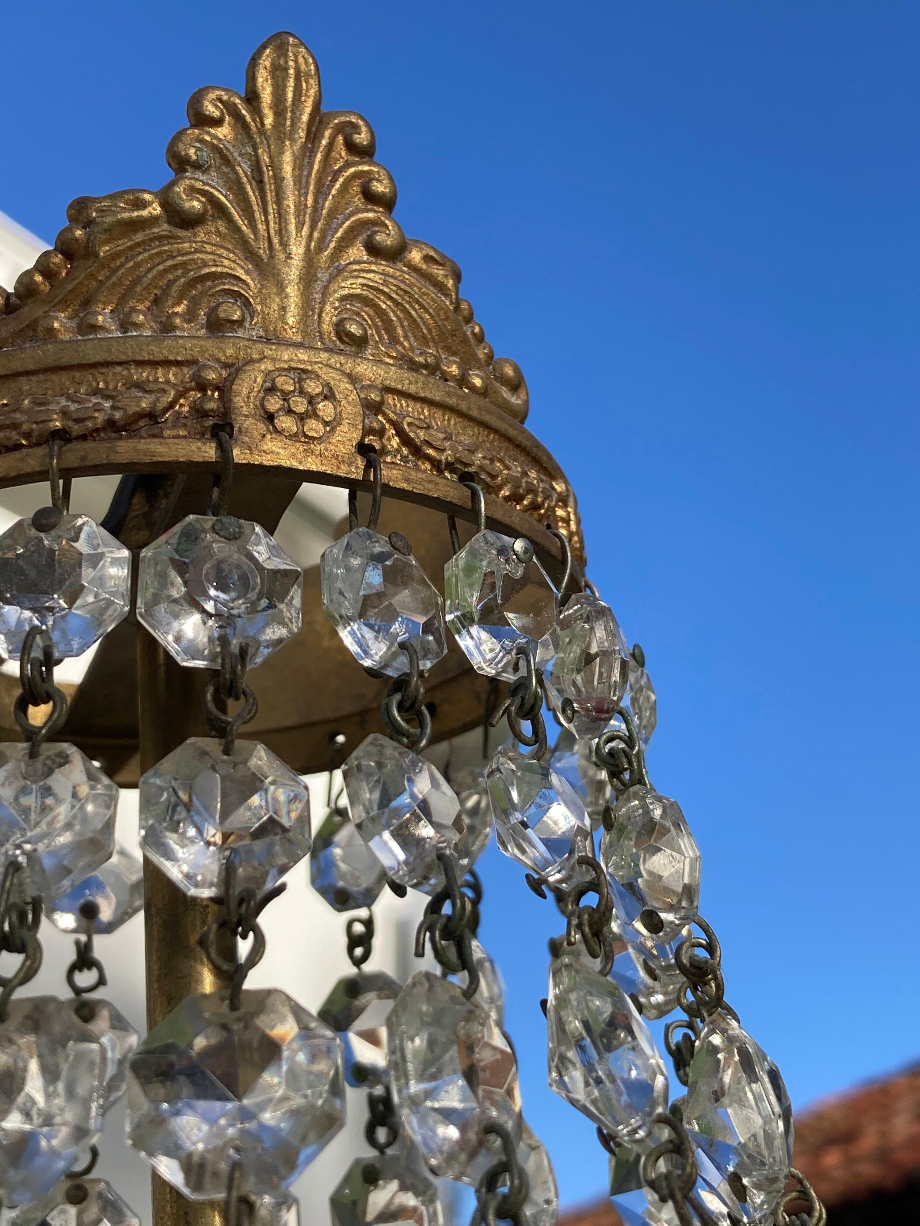 Balloon chandelier with glass crystal and brass tassels in empire style