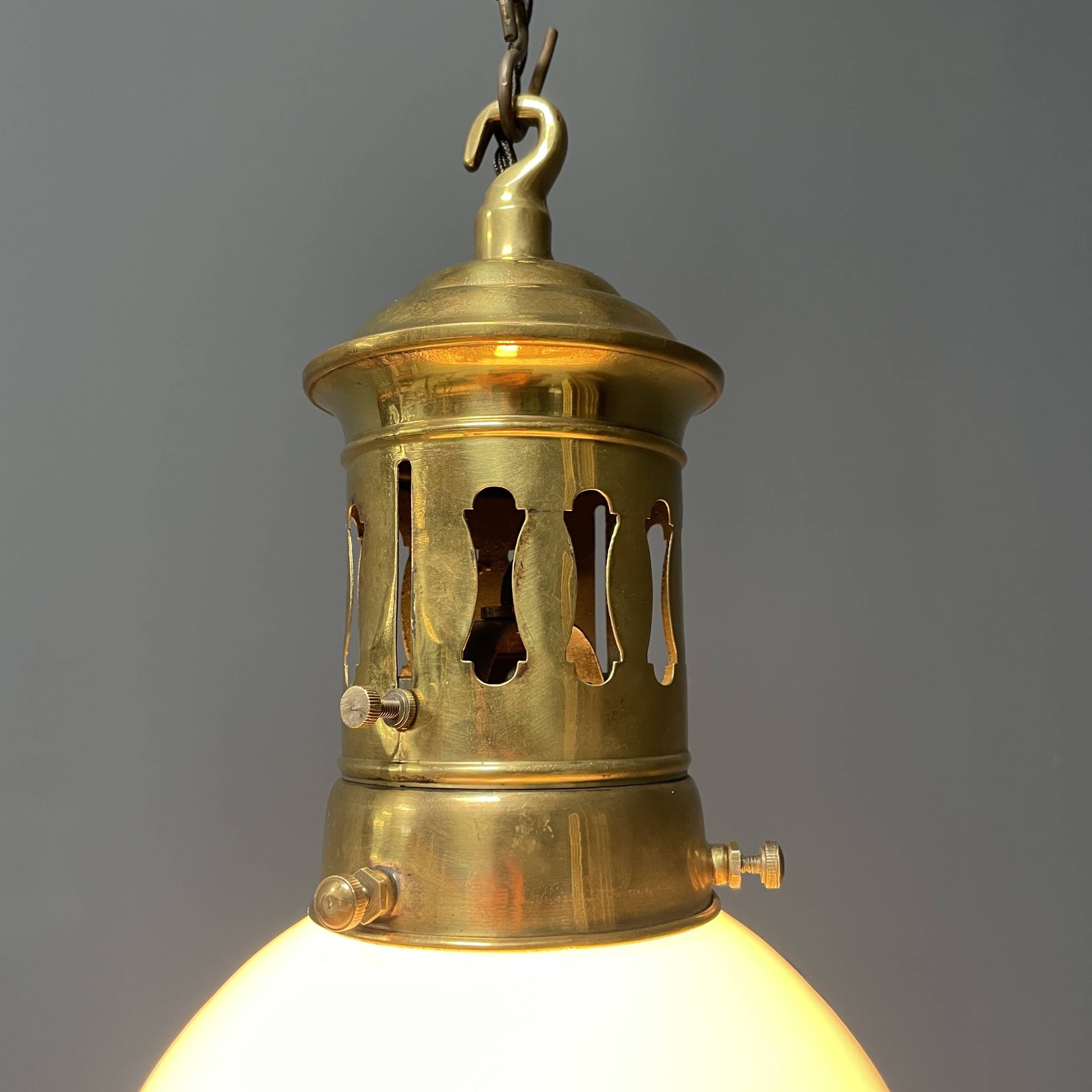 Opaline glass pendant lamp with elegant brass fixture