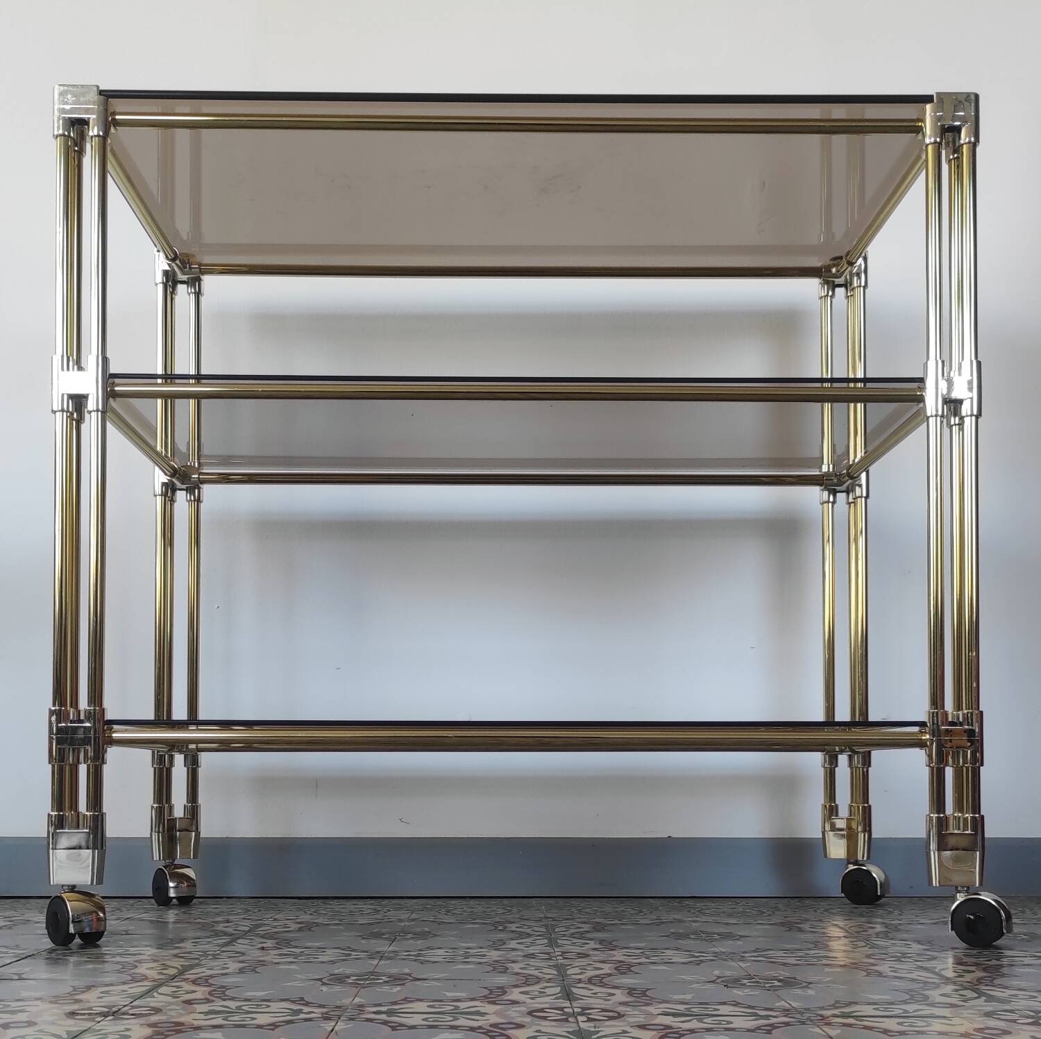 Dessert, vintage gold rolling bar, chrome and smoked glass.