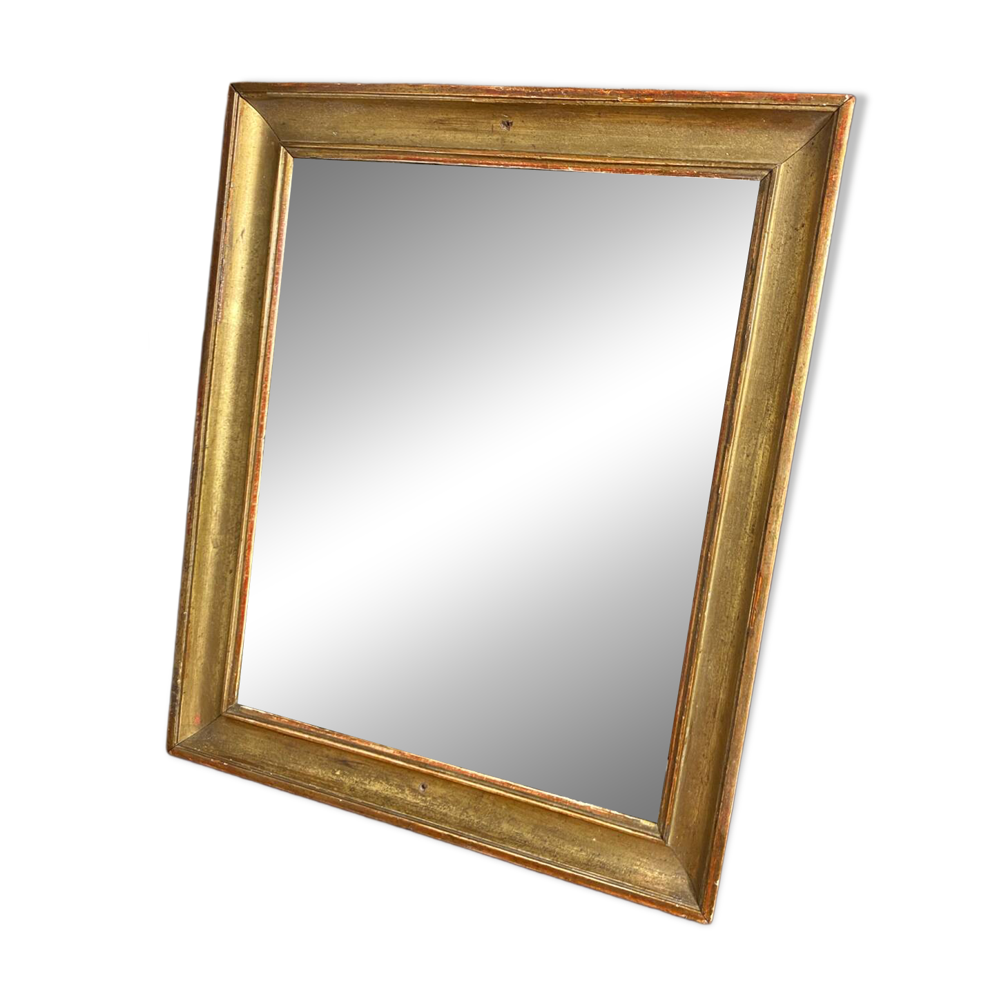 Antique mirror in gilded wood