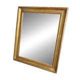 Antique mirror in gilded wood