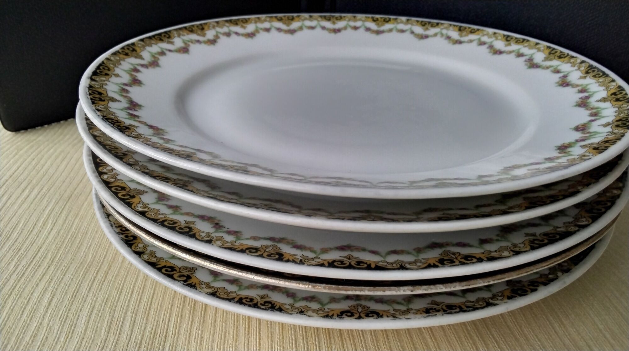 Set of 4 antique hollow plates in Limoges ULM porcelain