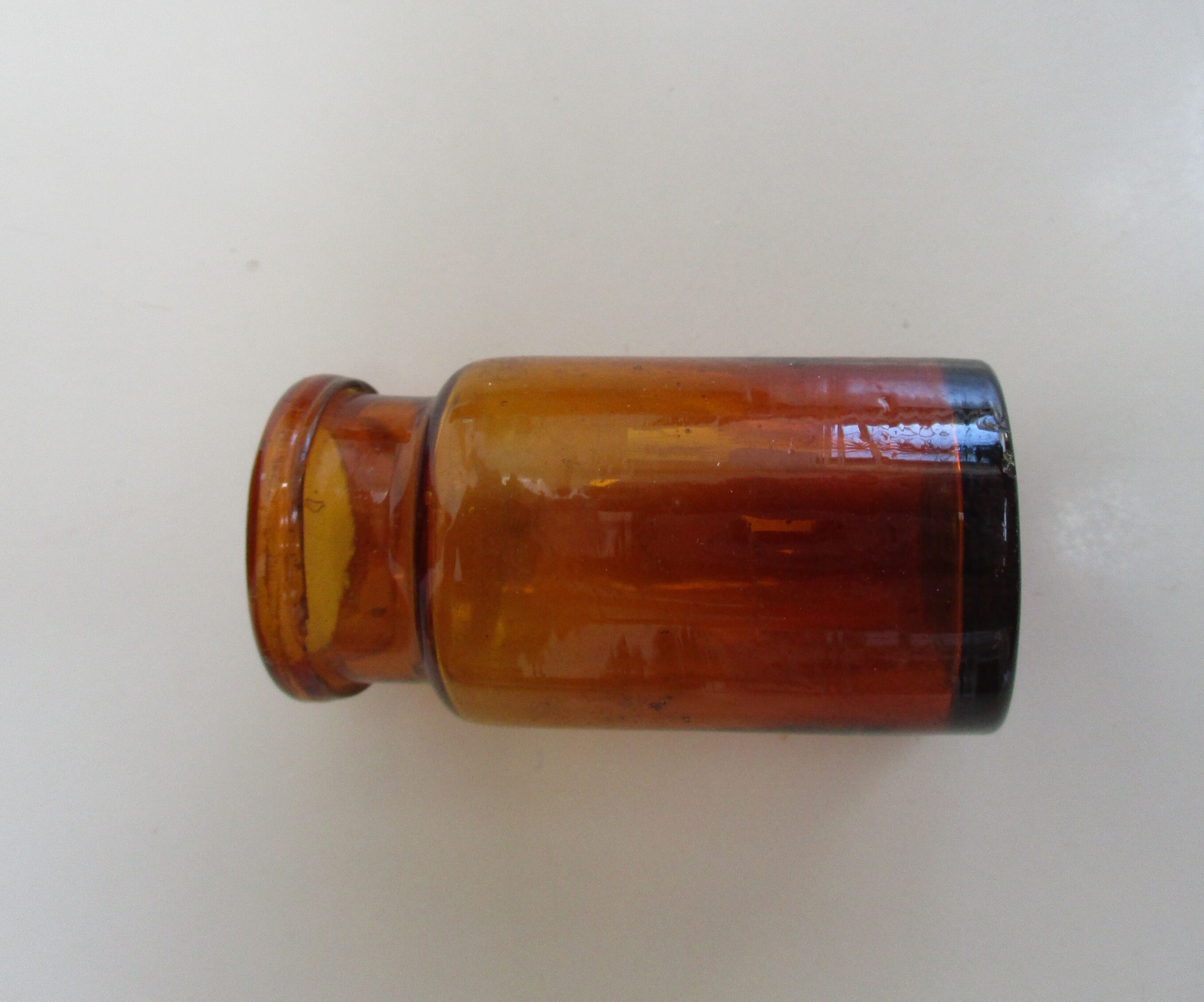 Lot of 3 old amber glass bottles