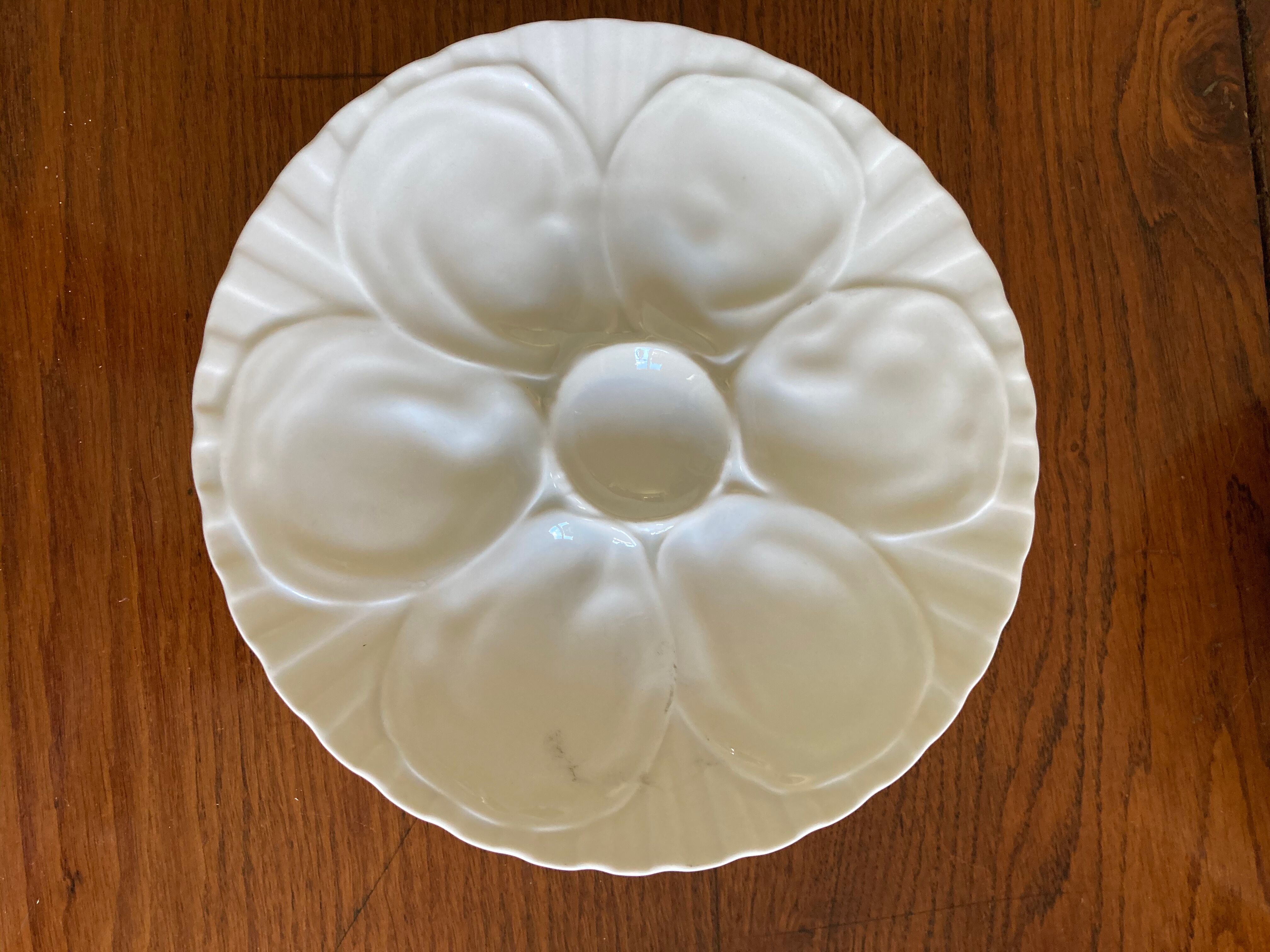 Series of 12 oyster plates