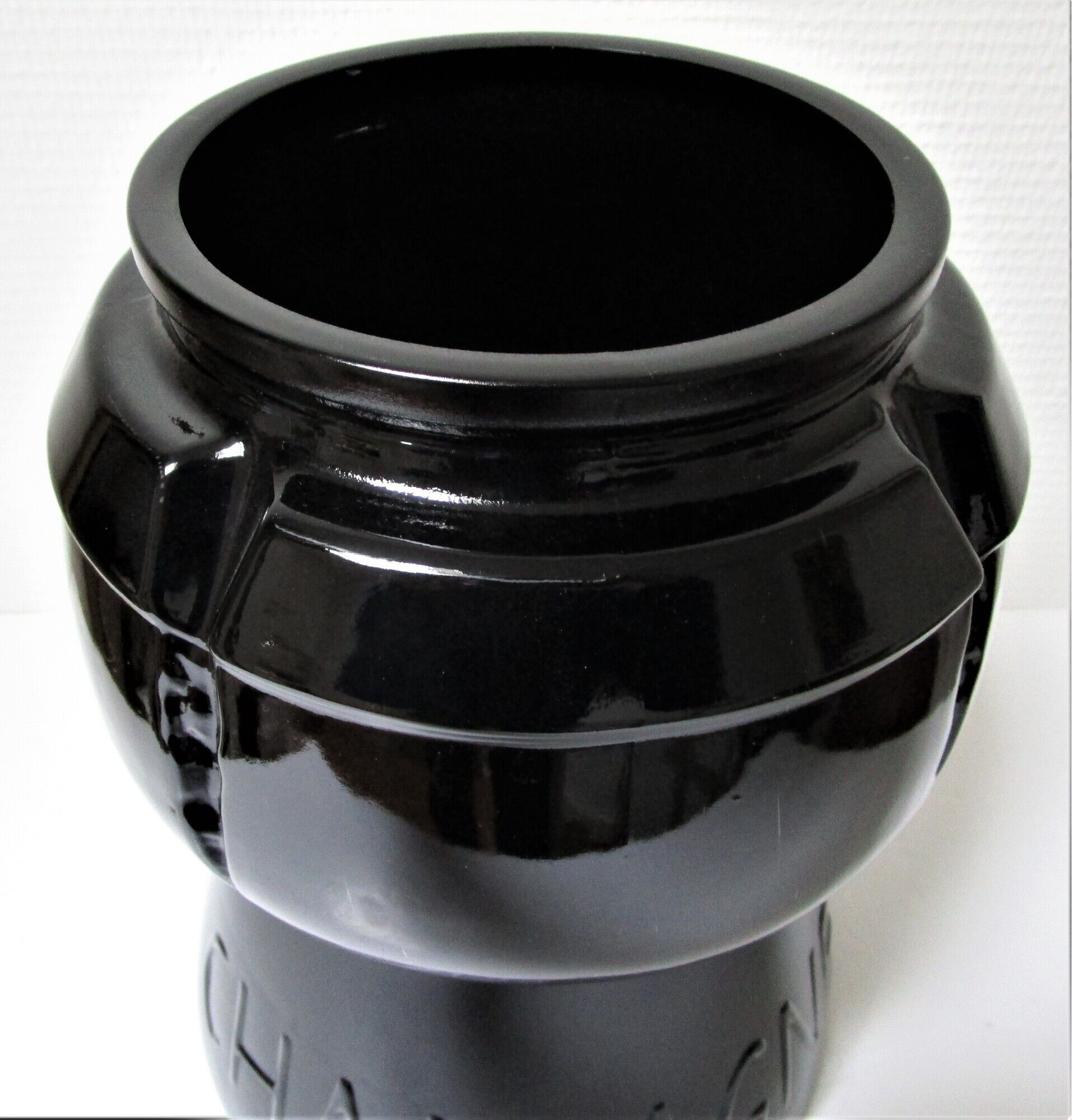 Champagne bucket design black glass in the shape of a 70s cork