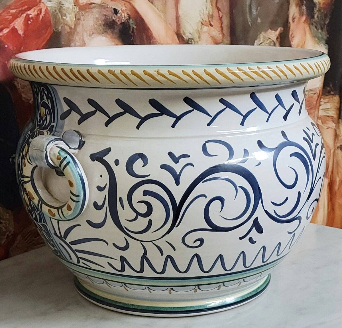 Italy early 20th century: Large cachepot or planter in glazed earthenware.