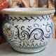 Italy early 20th century: Large cachepot or planter in glazed earthenware.