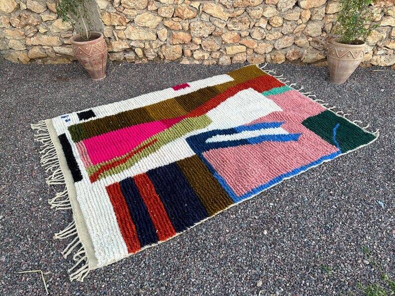 Authentic handmade rug with colourful patterns, size 150/250 cm.