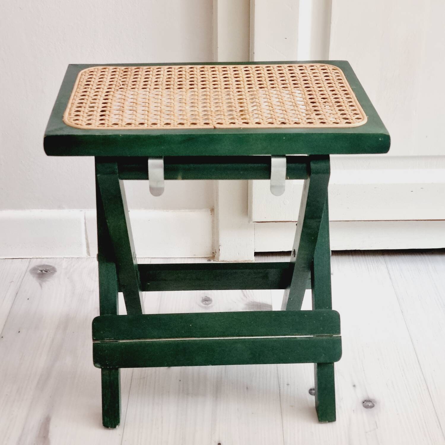 Small folding stool in green wood and cane