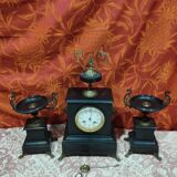 old Napoleon III marble fireplace surround with cups and pendulum