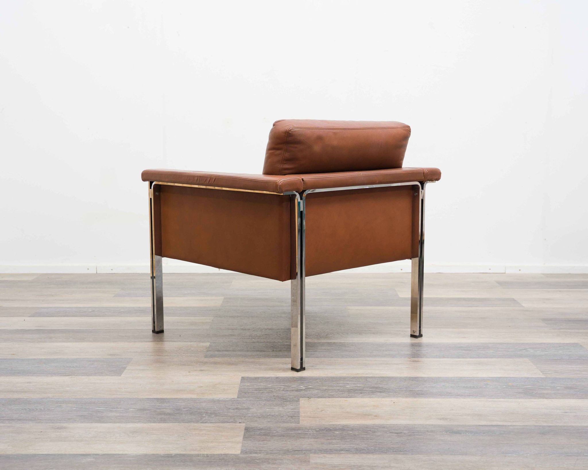 Leather armchair, 1970s, manufacturer Sitag, cognac brown leather.