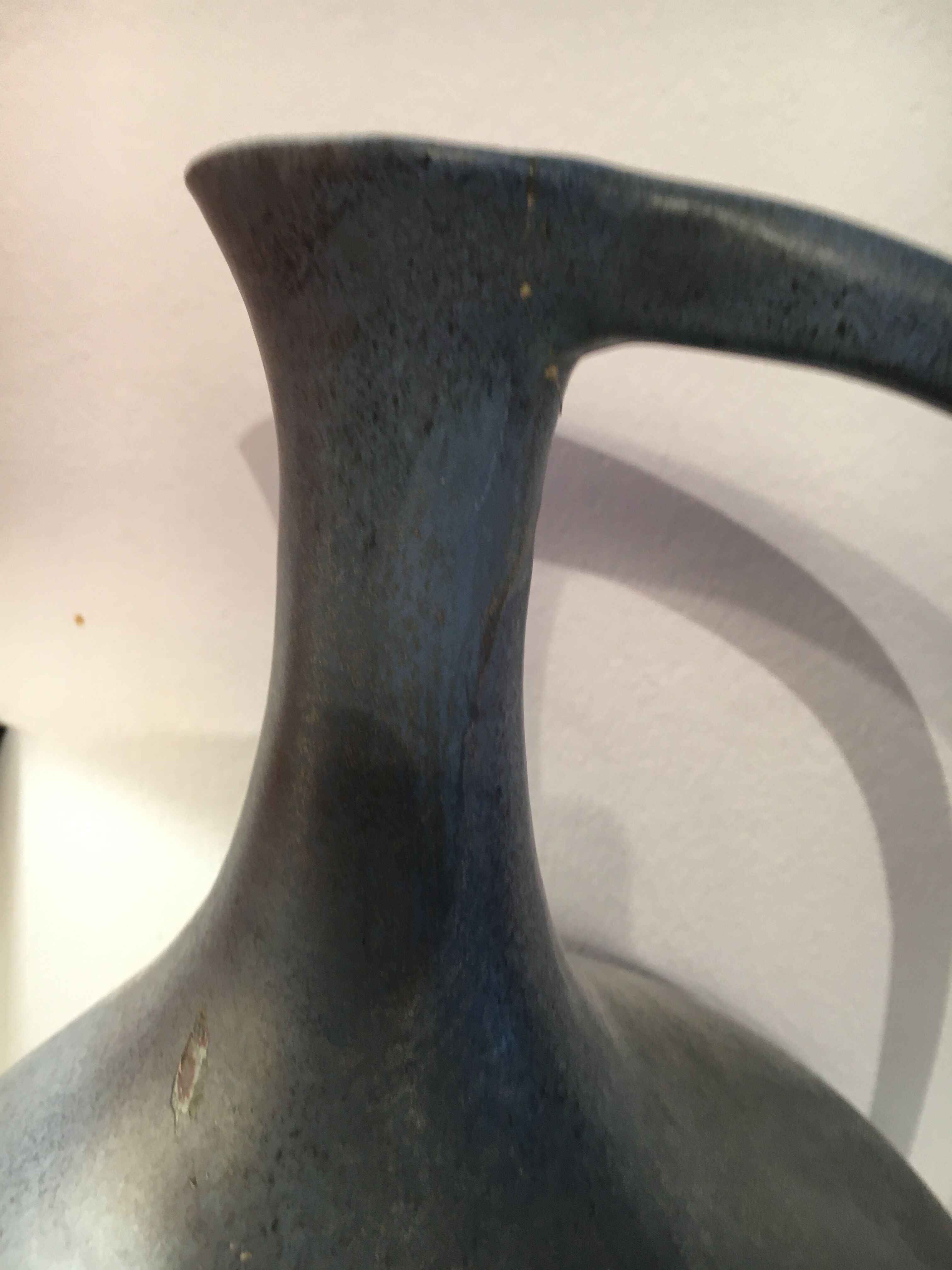 Vase with vintage Scandinavian blue ceramic handles. Signed Lienau