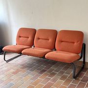 Strafor 3-seater bench, orange wool and sled base, 1970s.