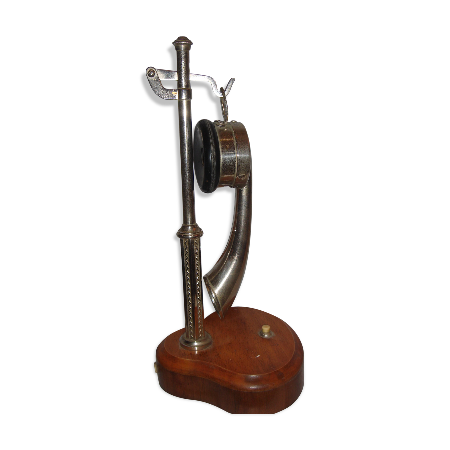 phone to cornea in 1900 on column with metal switch chrome