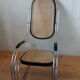 Rocking chair in chrome metal and wood