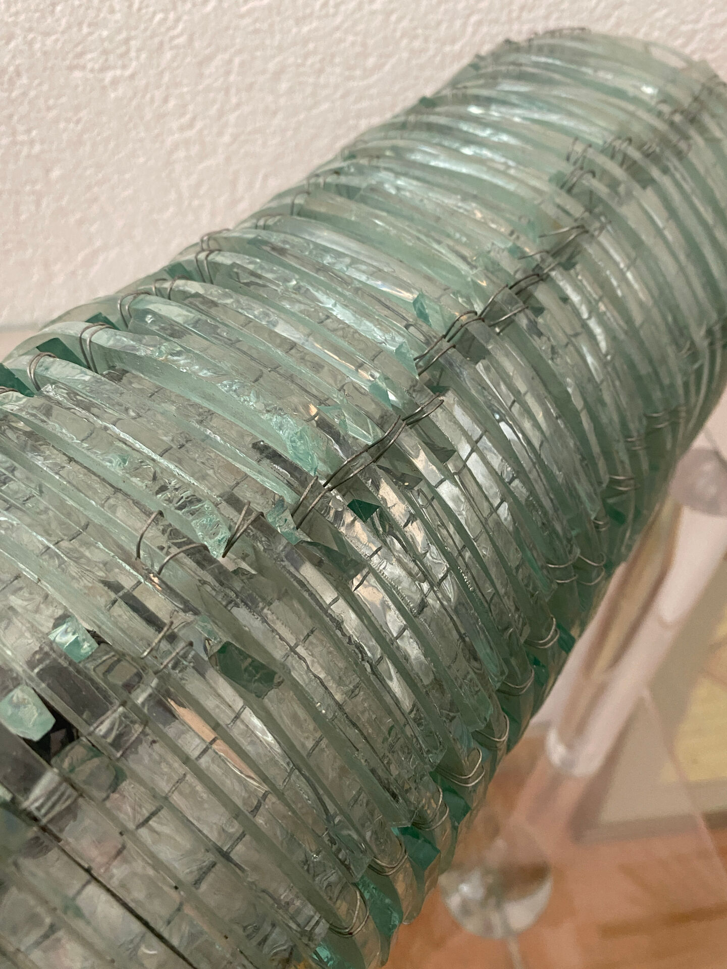 Blue-tinted glass lamp and wire.