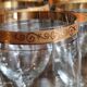 Set of 9 water or red wine glasses in crystal curled and gilded edging