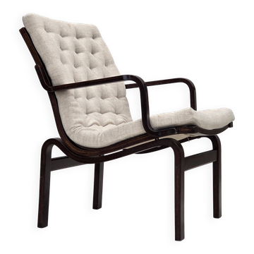 Fauteuil scandinave des années 1970, en laine de meuble, bois de hêtre foncé.