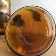 Old bottle of pharmacy "aqua sedativa" brown glass